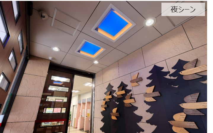 北海道信用金庫 山鼻中央支店様の風除室に設置された「青空照明」(夜)